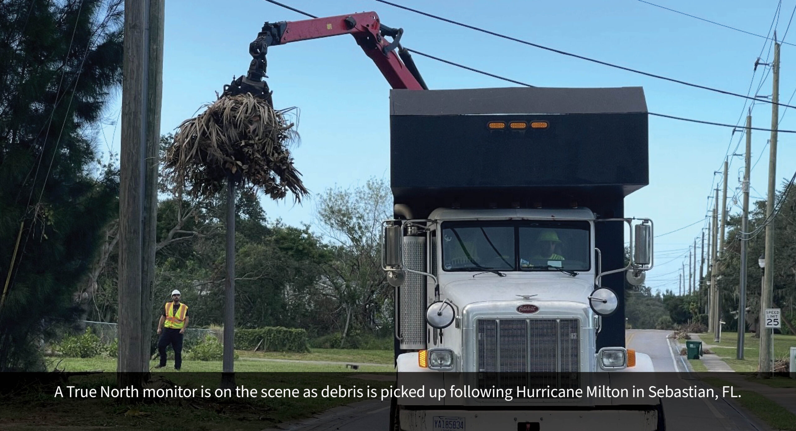 A True North monitor is on the scene as debris is picked up following Hurricane Milton in Sebastian, FL.