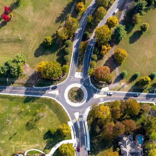 Aerial view of a two-lane roundabout.