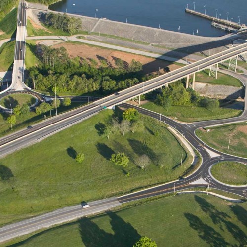 An aerial view of a roundabout just off the highway.