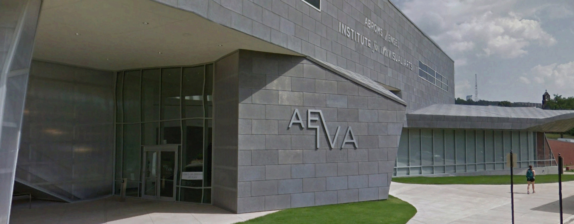The front of the institute. It's a brick wall with letters that read "AEIVA."