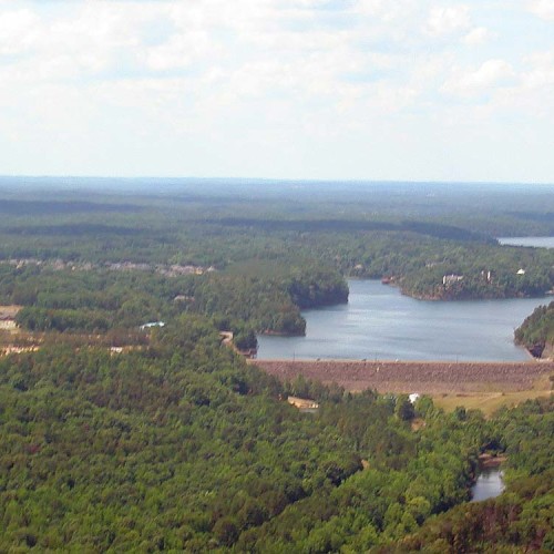 Aerial view of Lake Tuscaloosa surrounded by trees.